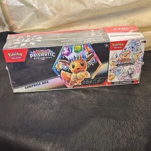 Pokemon Prismatic Evolutions Surprise Box - Red and Blue